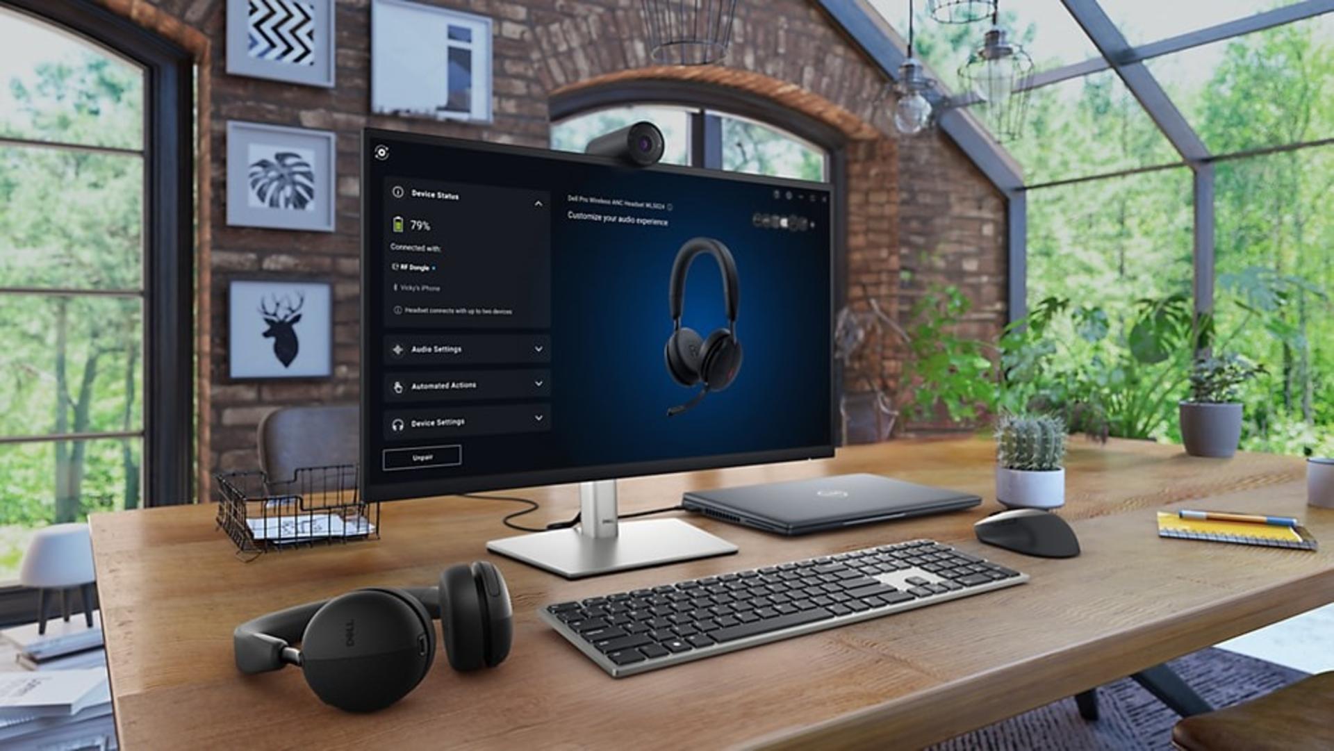 هدست ANC دل مدل WL5024 روی میز در کنار مانیتور