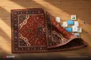 فایل‌های دیجیتال و پوشه‌ها زیر لبه‌ی یک فرش سنتی پنهان شده‌اند
