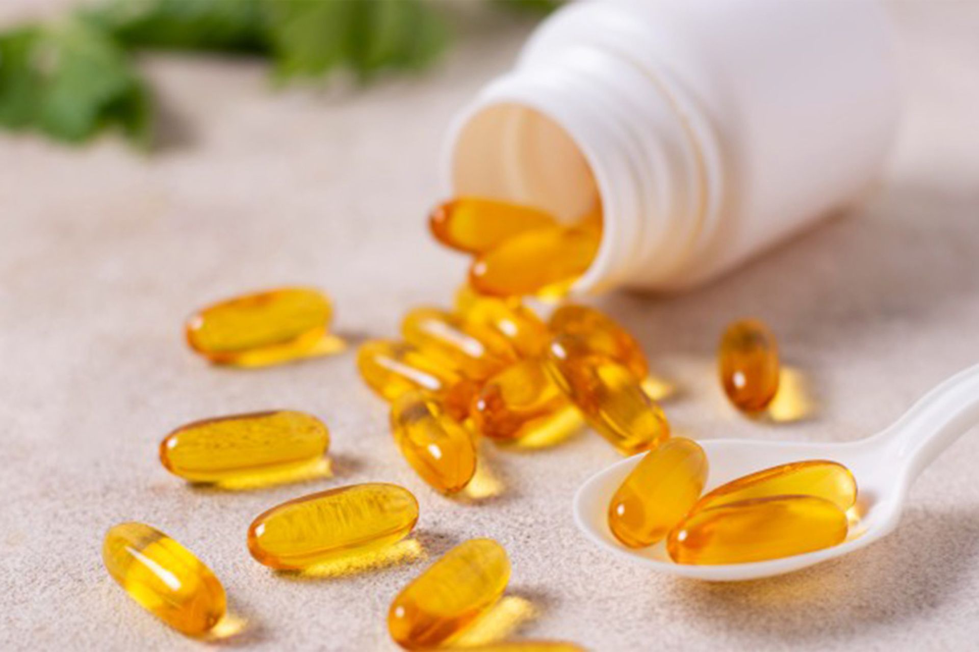 تصویری از بطری قرص ویتامین D روی میز