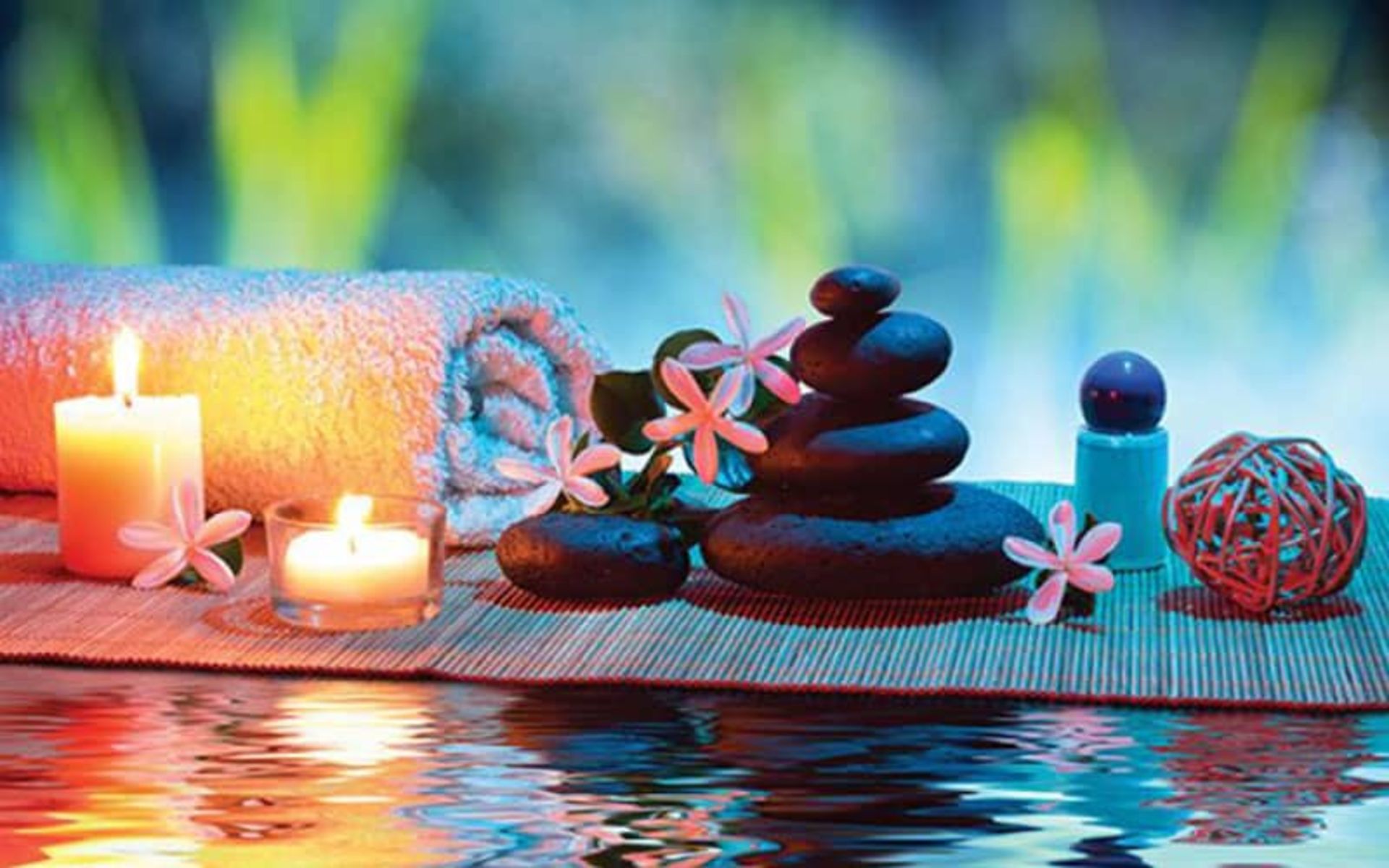 شمع و سنگ روی حصیری روی آب