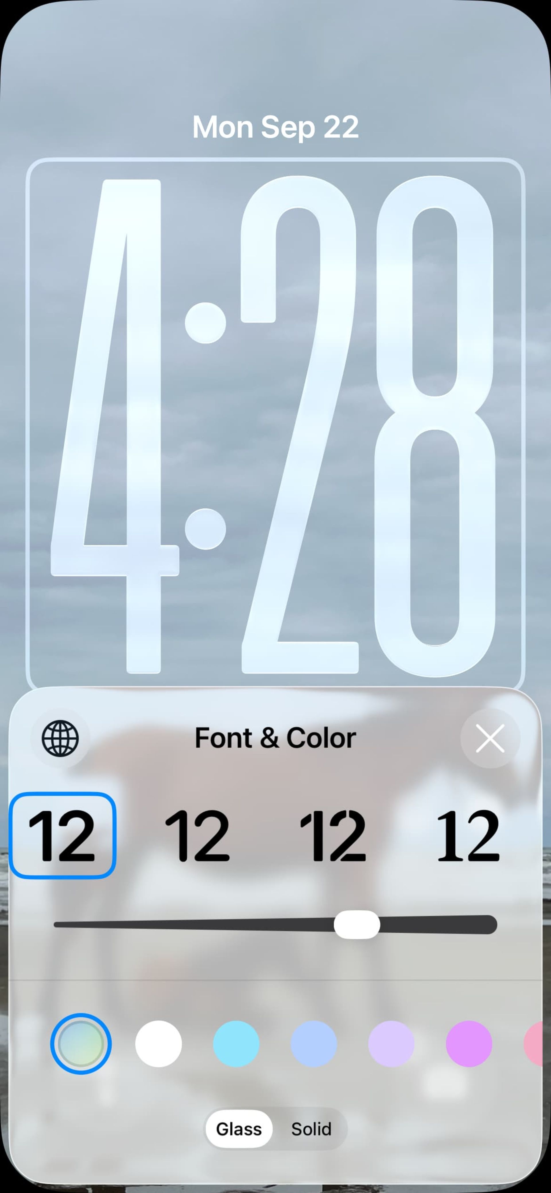 افزایش سایز ساعت در لاک‌اسکرین در iOS 26
