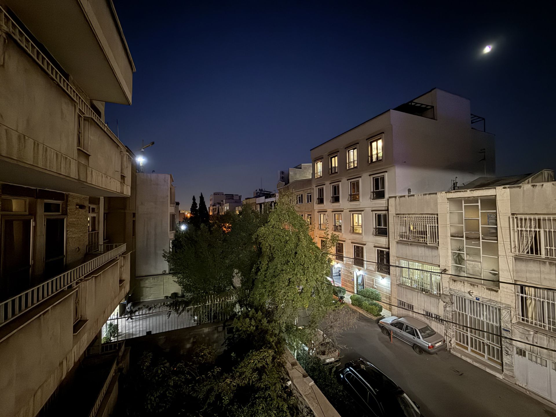 The buildings of Pakistan Street in Tehran in the dark of the night - iPhone 16 Pro ultrawide camera