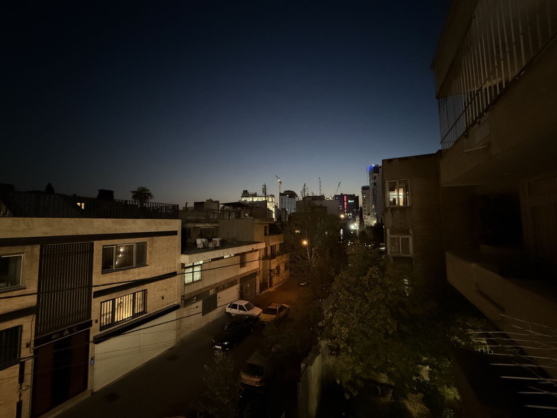 View of the buildings around Zomit office on Pakistan Street - iPhone 16 Pro Ultra Wide Camera in the dark