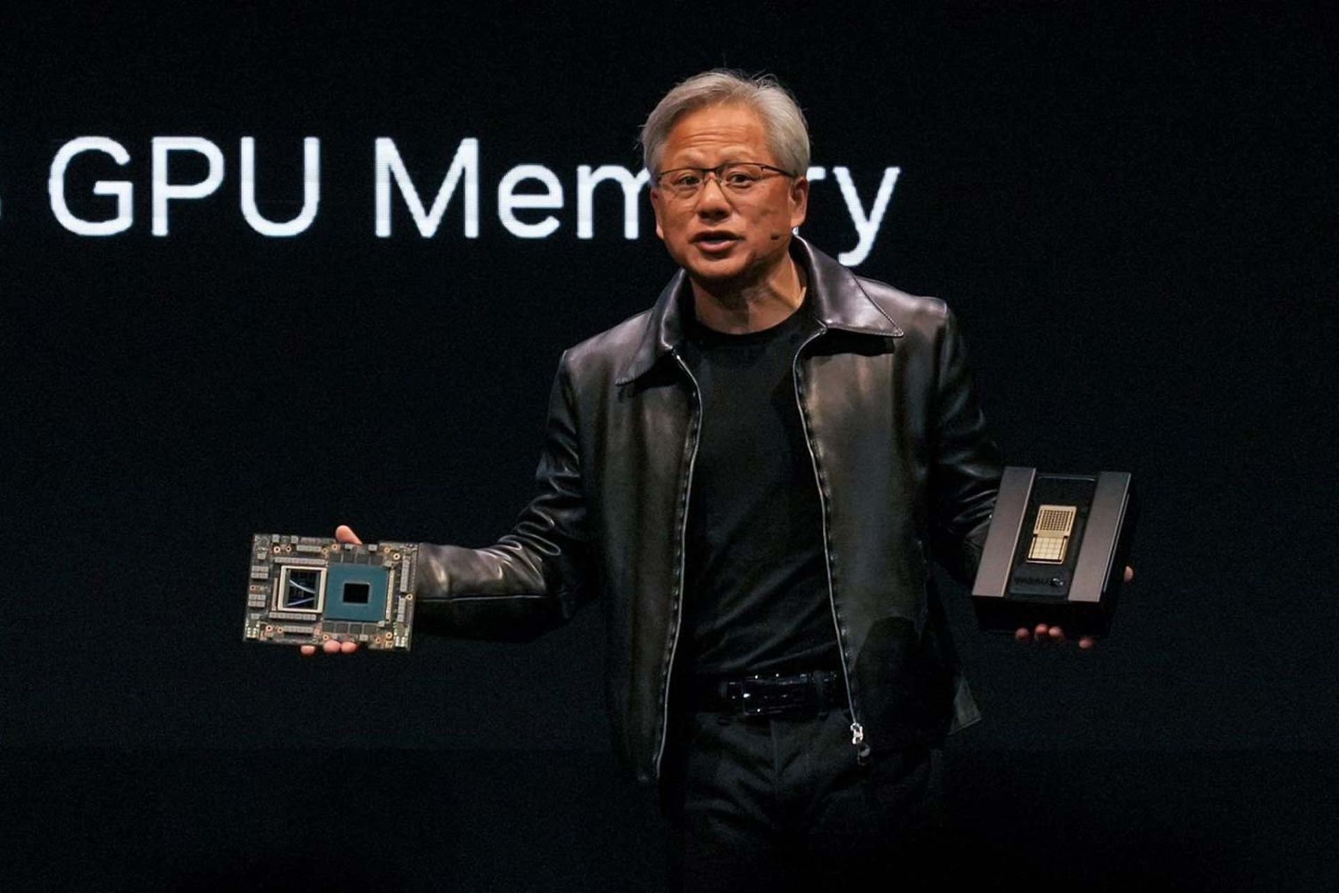 Nvidia CEO Jensen Huang talking GPU in hand