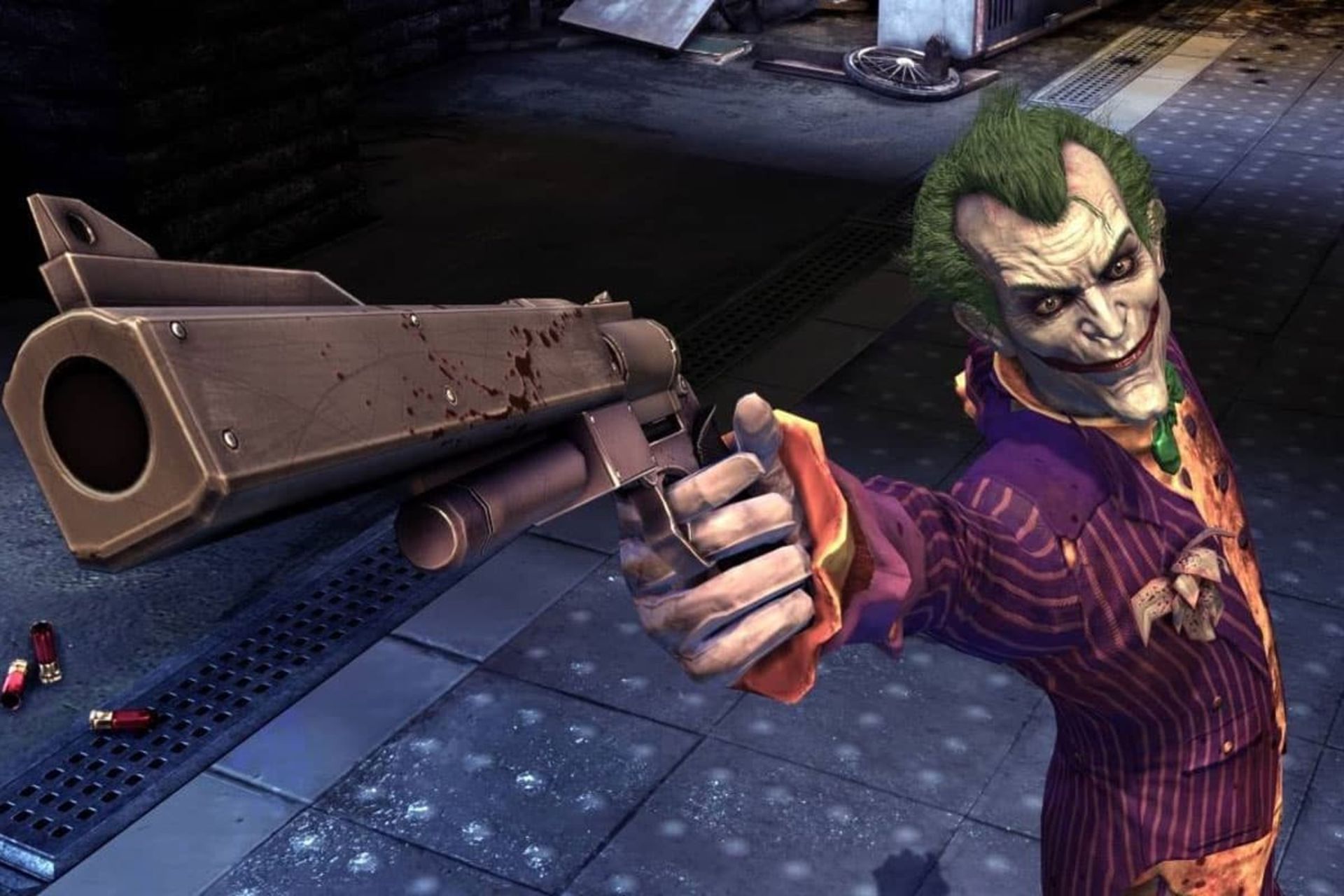 جوکر؛ شخصیت بازی Batman: Arkham Asylum با کت شلوار بنفش و موهای سبز در حالی که تفنگی را نشانه گرفته است