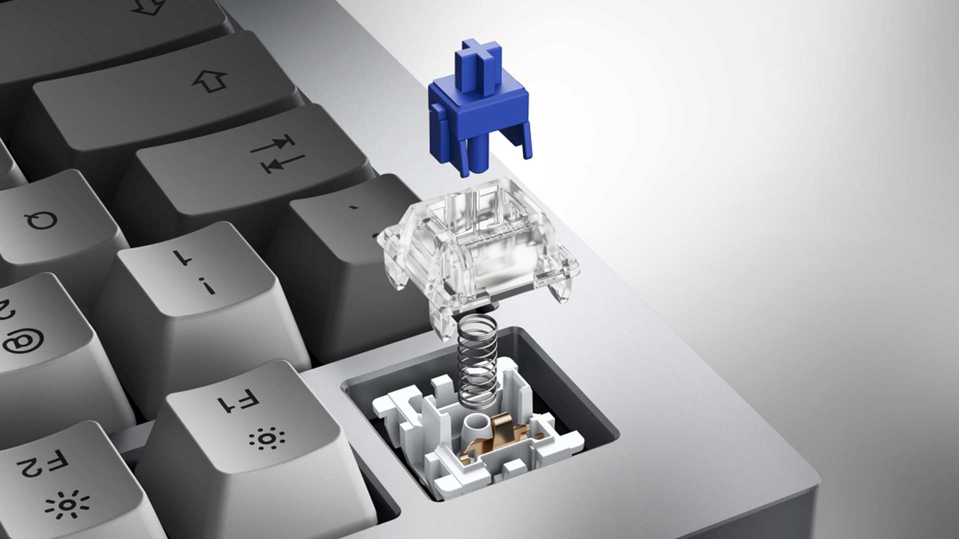 یکی از دکمه های OnePlus Featuring Keyboard 81 Pro باز شده و قطعات داخلش دیده می شوند