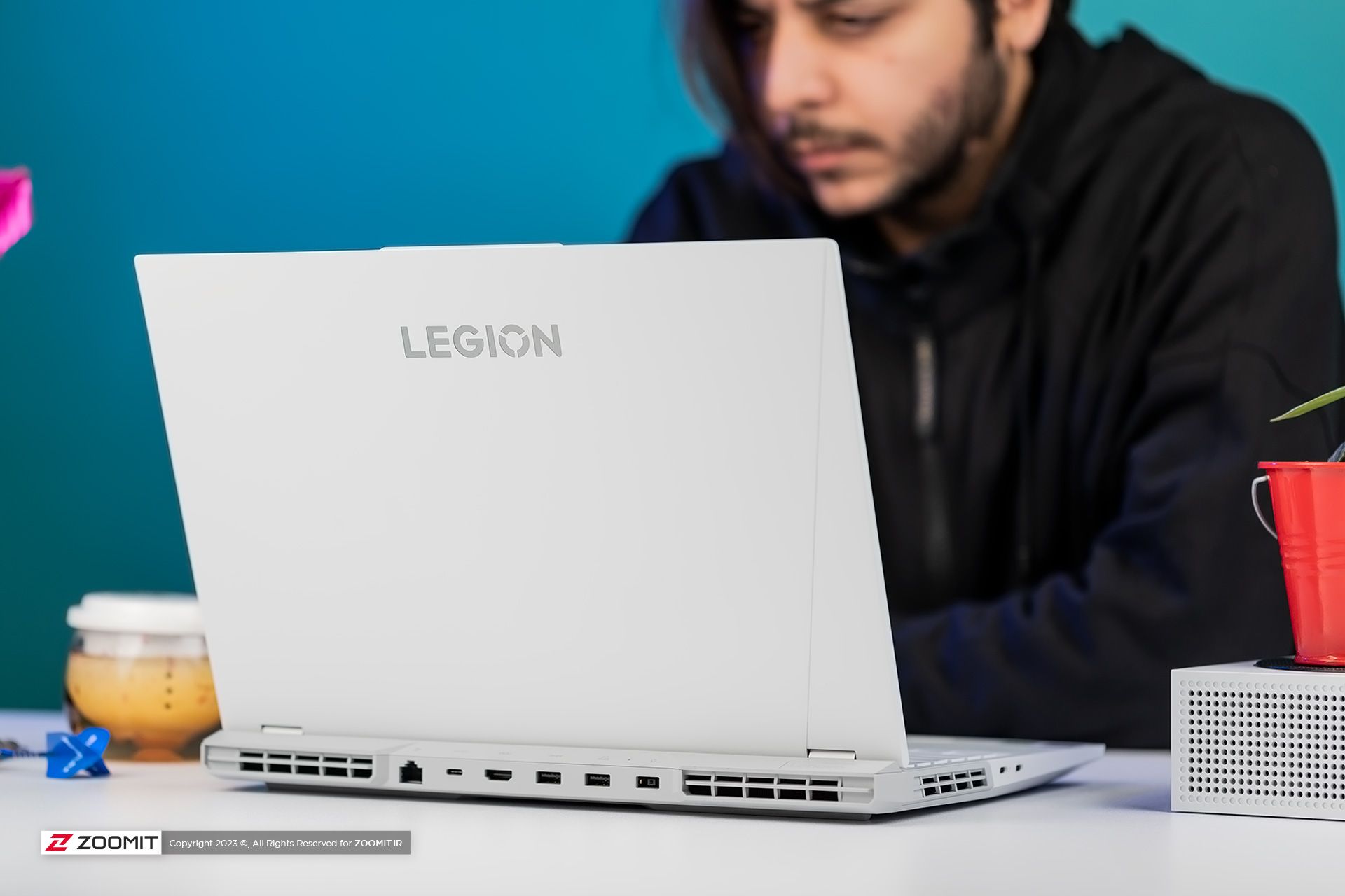 User working with Lenovo Legion 5 Pro laptop