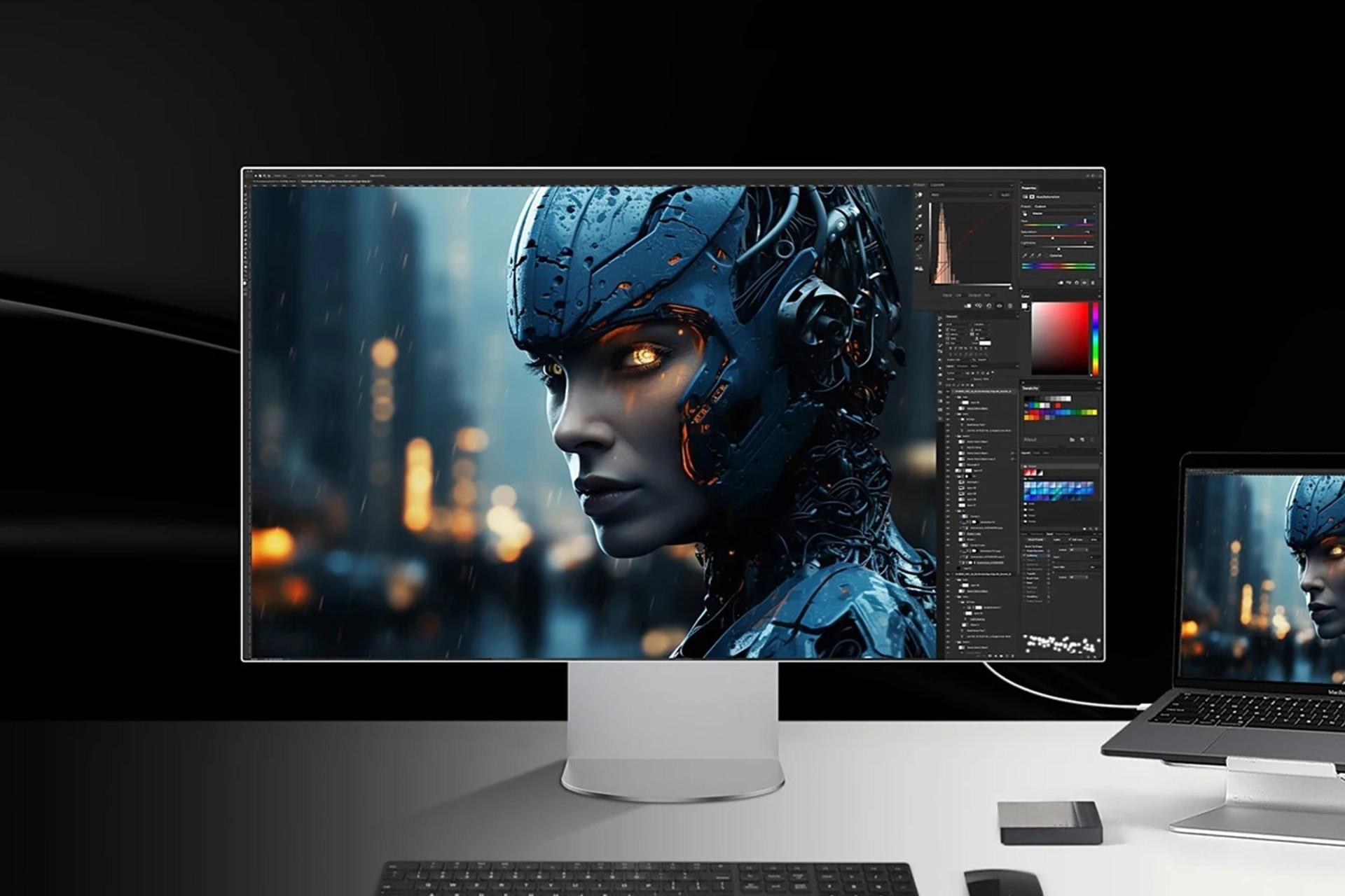 نمای جلو مانیتور LG 6K روی میز کنار لپ‌تاپ