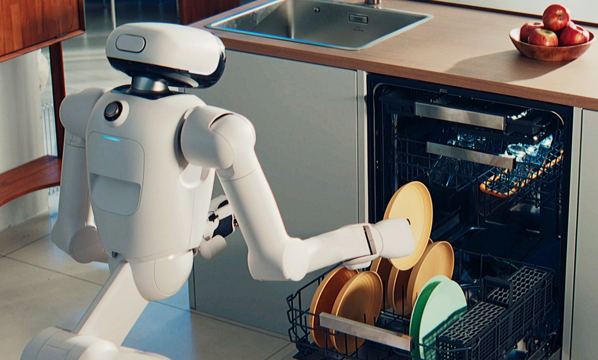 ربات ال‌جی در حال گذاشتن ظرف‌ها داخل ماشین ظرفشویی