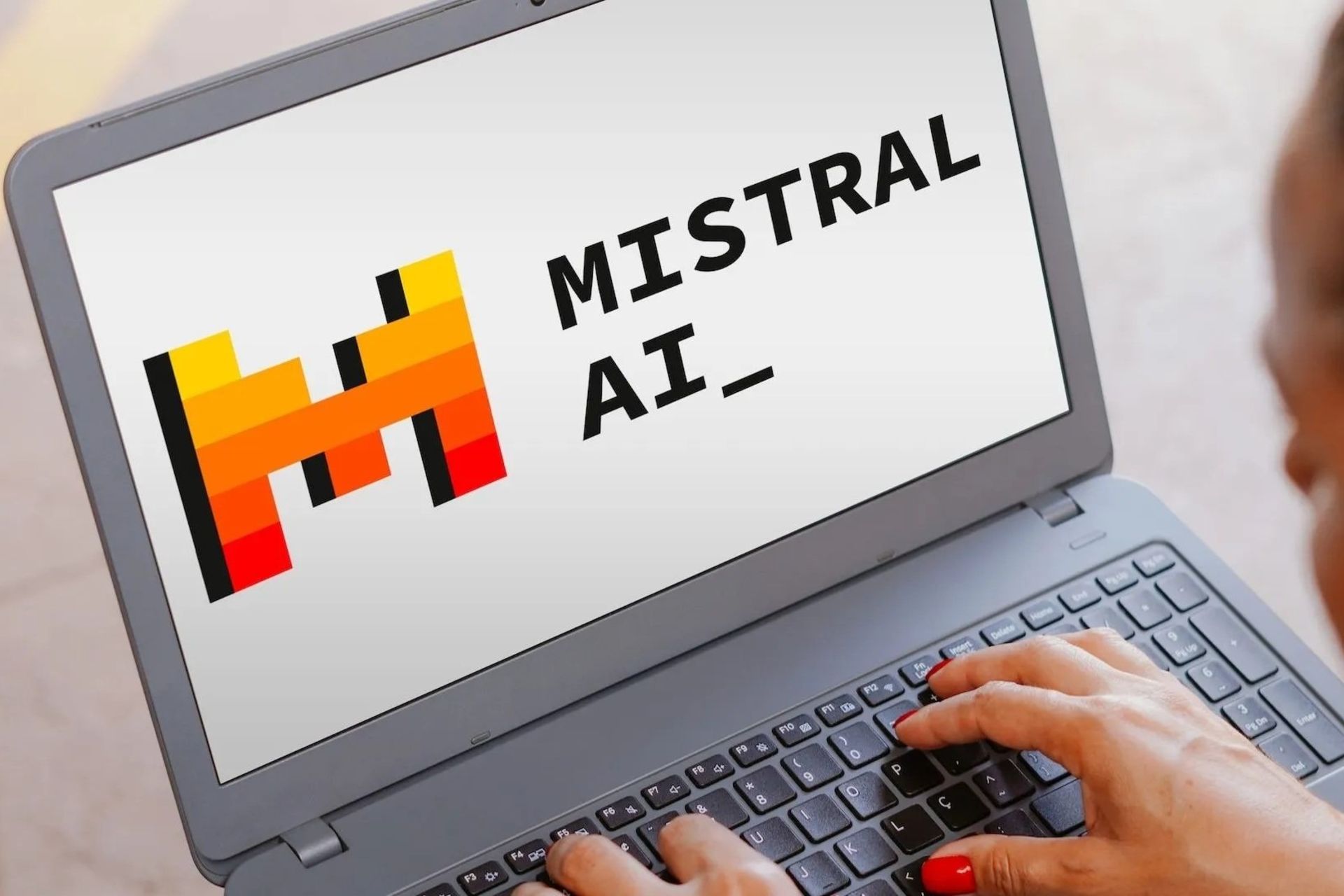 لوگو میسترال Mistral ai روی لپ تاپ