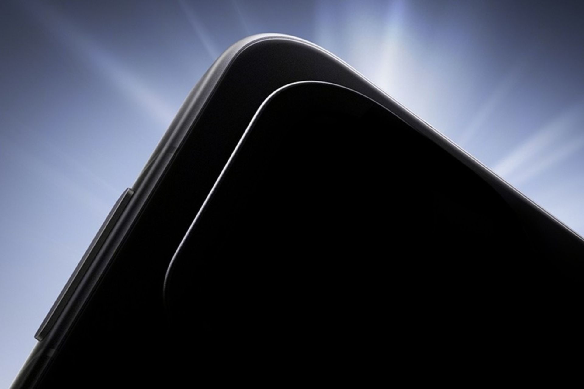 گوشه‌ای از یک موبایل در سایه‌ی تاریک