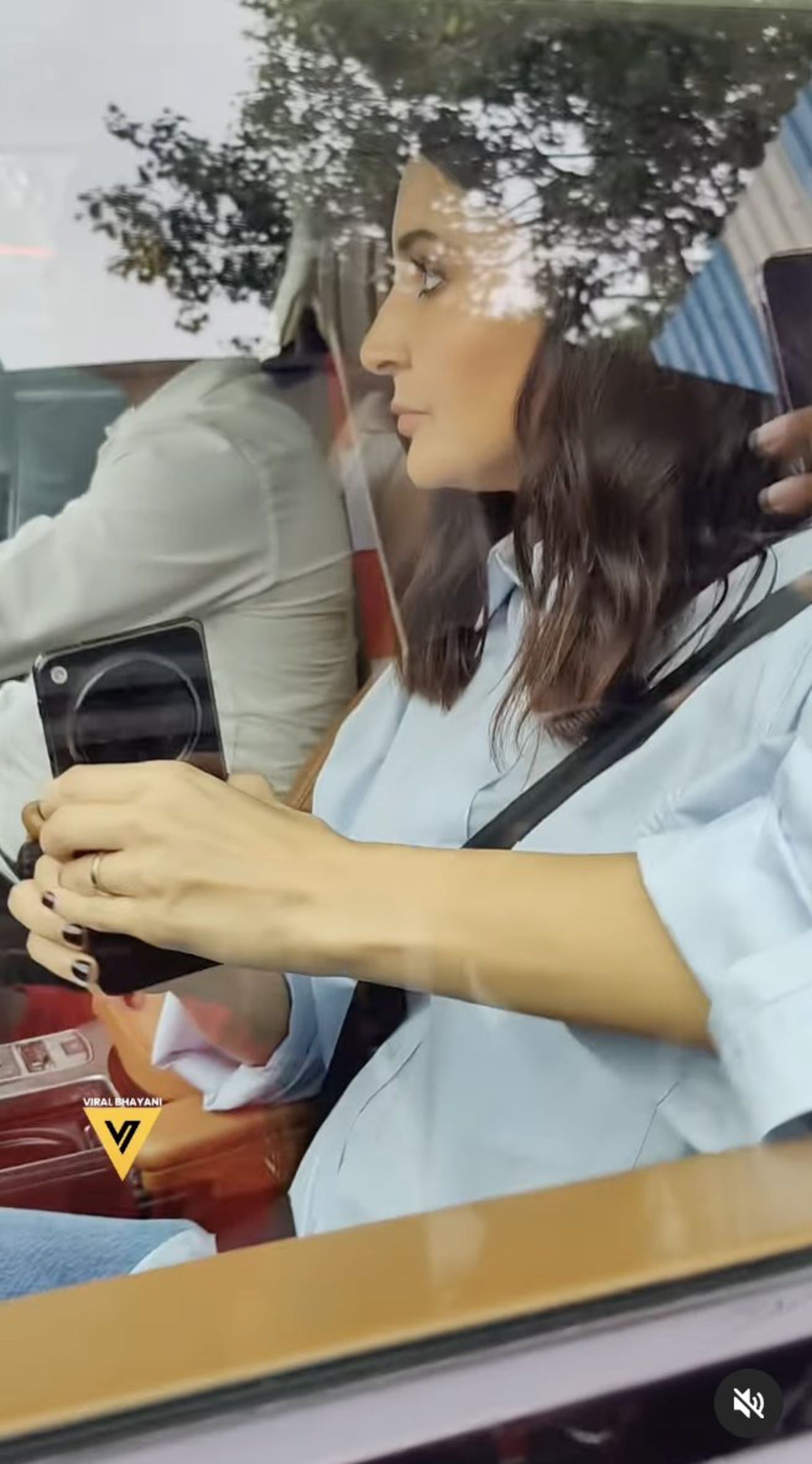 OnePlus Open being used by Indian Movie Star in a Car with Closed Windows