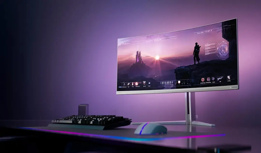 مانیتور گیمینگ ۳۴ اینچی فیلیپس با پنل منحنی QD-OLED روی میز کار