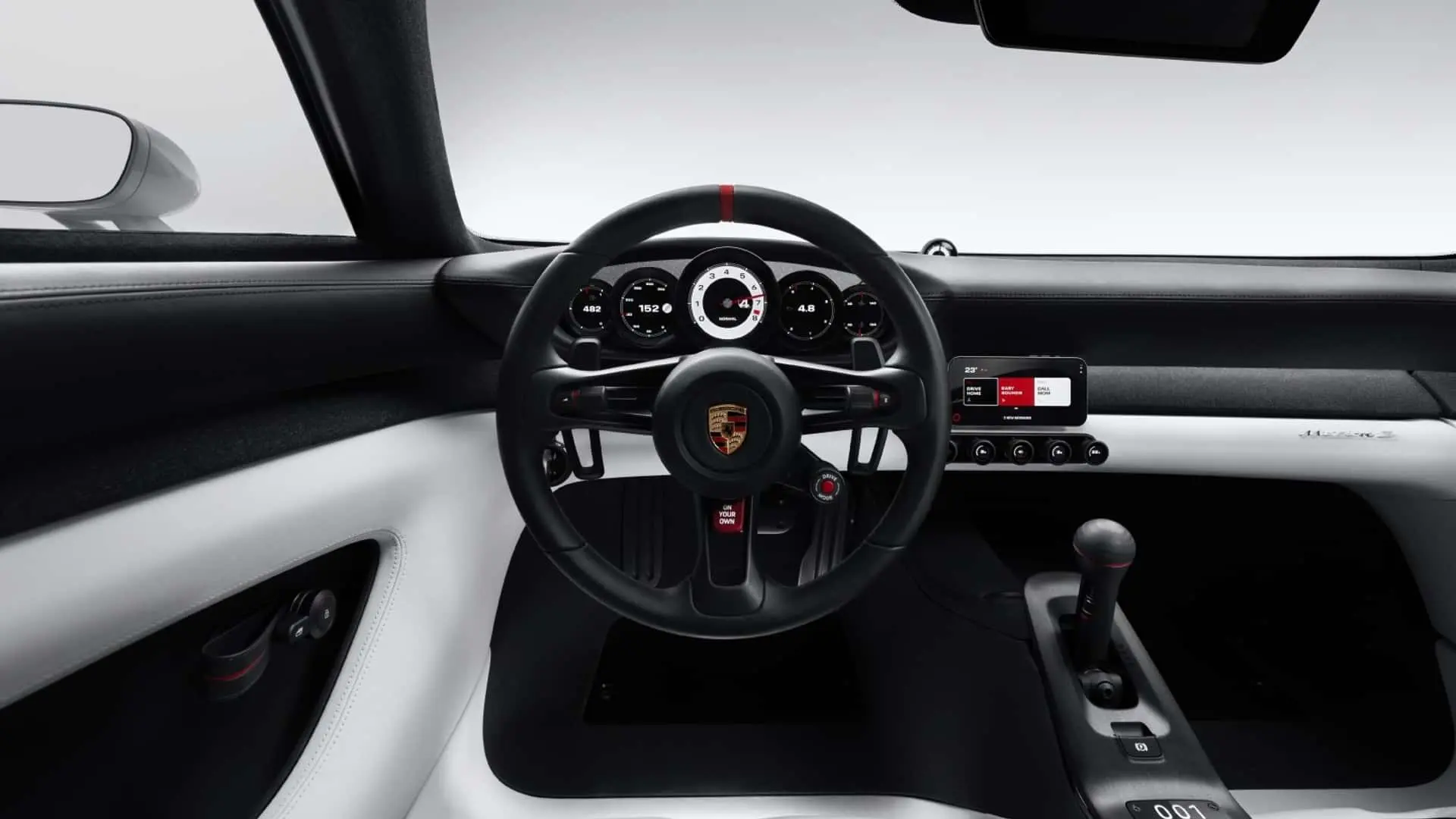 نمای داخلی کابین و فرمان خودروی پورشه (Porsche) با طراحی مدرن