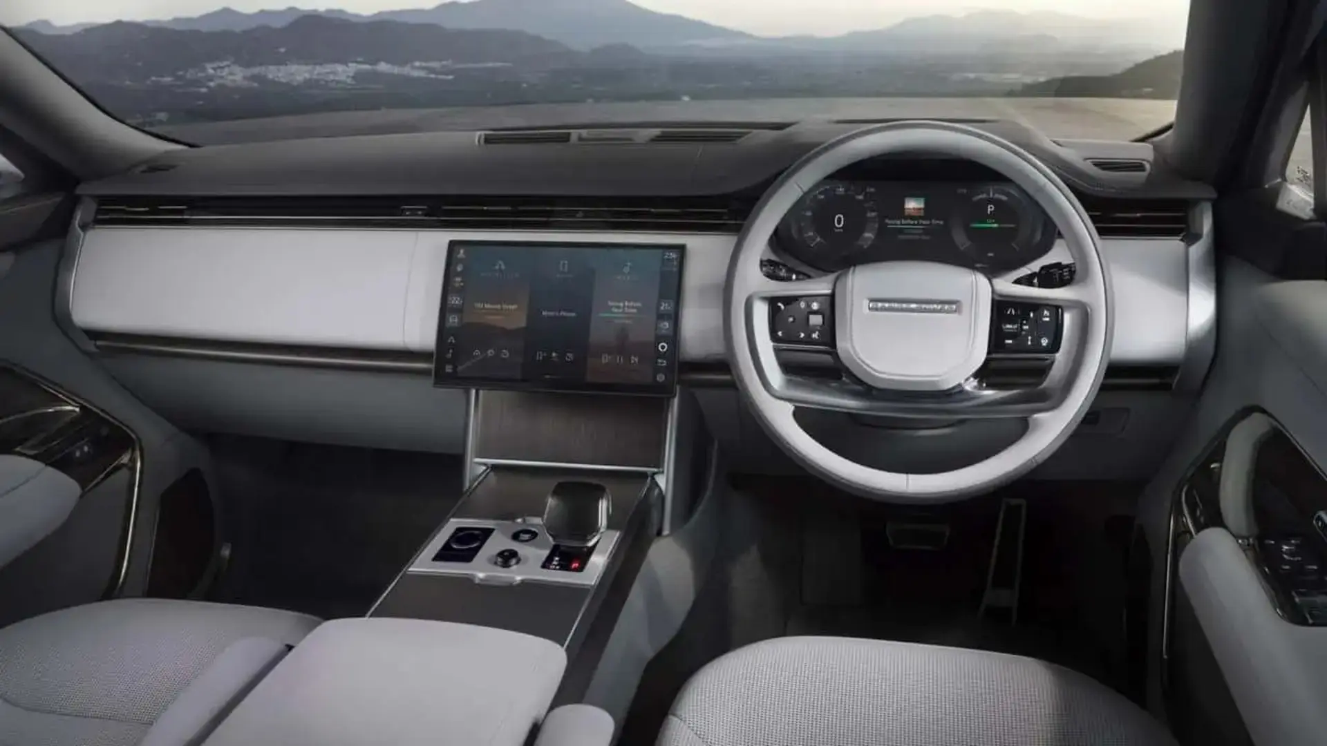 داشبورد و کابین داخلی خودروی رنج‌روور الکتریک (Range Rover Electric) با نمایشگرهای دیجیتال