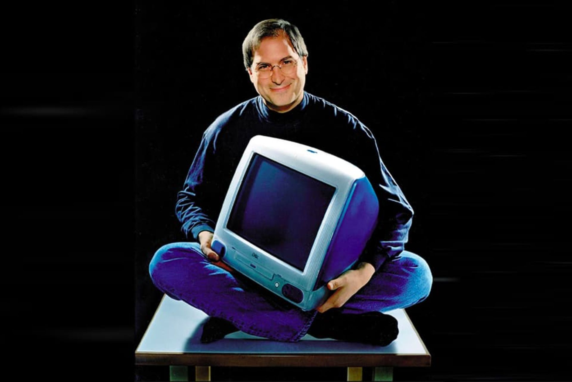 The first iMac in the arms of Steve Jobs