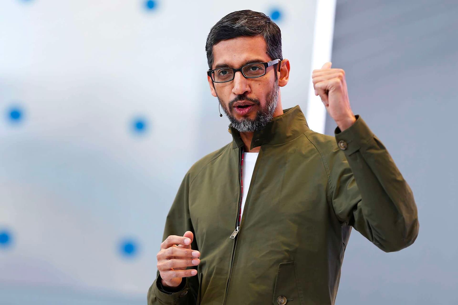 Google CEO Sundar Pichai in a green coat