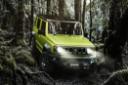 سوزومی جیمنی 5 درب Suzuki Jimny 5-door 2023 نمای جلو آفرود در جنگل