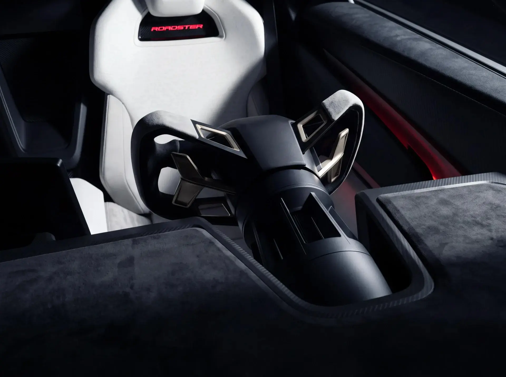 کابین خودروی تسلا رودستر (Tesla Roadster) با فرمان و صندلی سفید