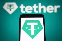 لوگوی ارز دیجیتال تتر (Tether) روی صفحه نمایش یک گوشی هوشمند