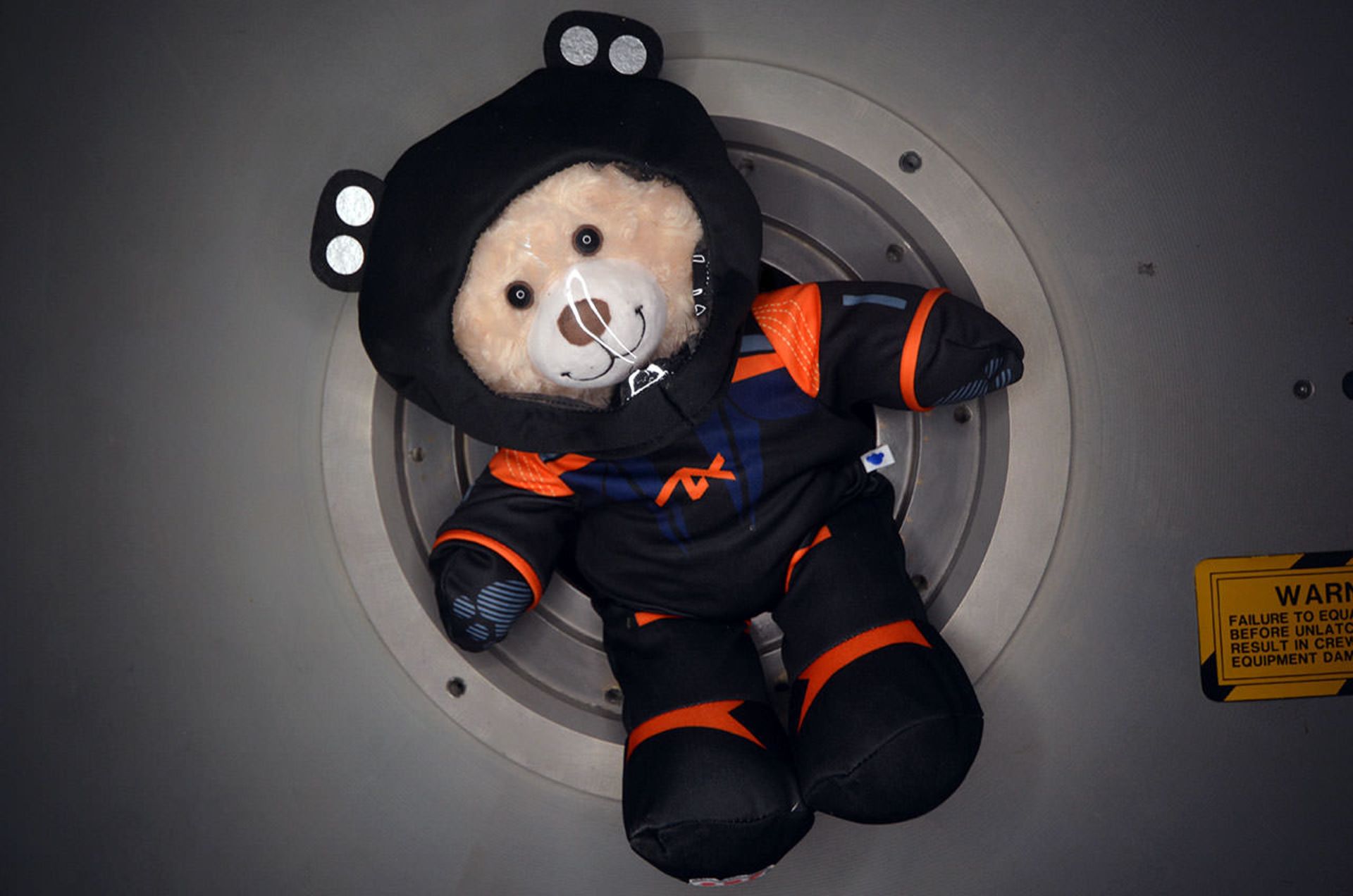 A teddy bear representing zero gravity in the Axiom 2 mission