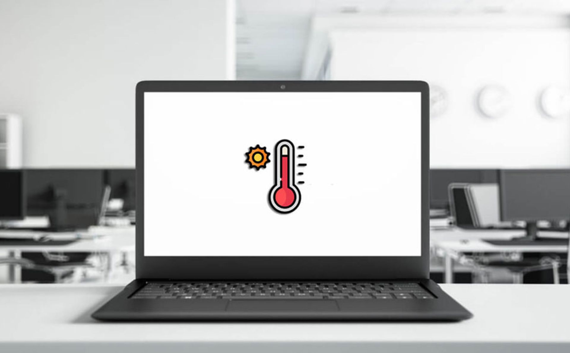 تصویر دماسنج روی نمایشگر لپ‌تاپ