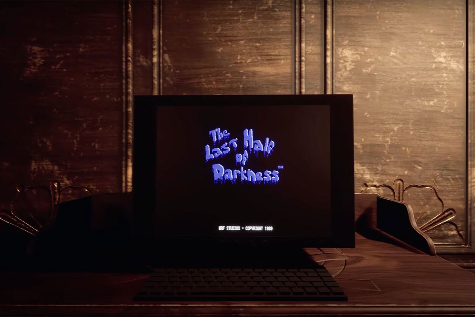 یک نمایشگر در اتاقی تاریک در حال نمایش لوگو بازی