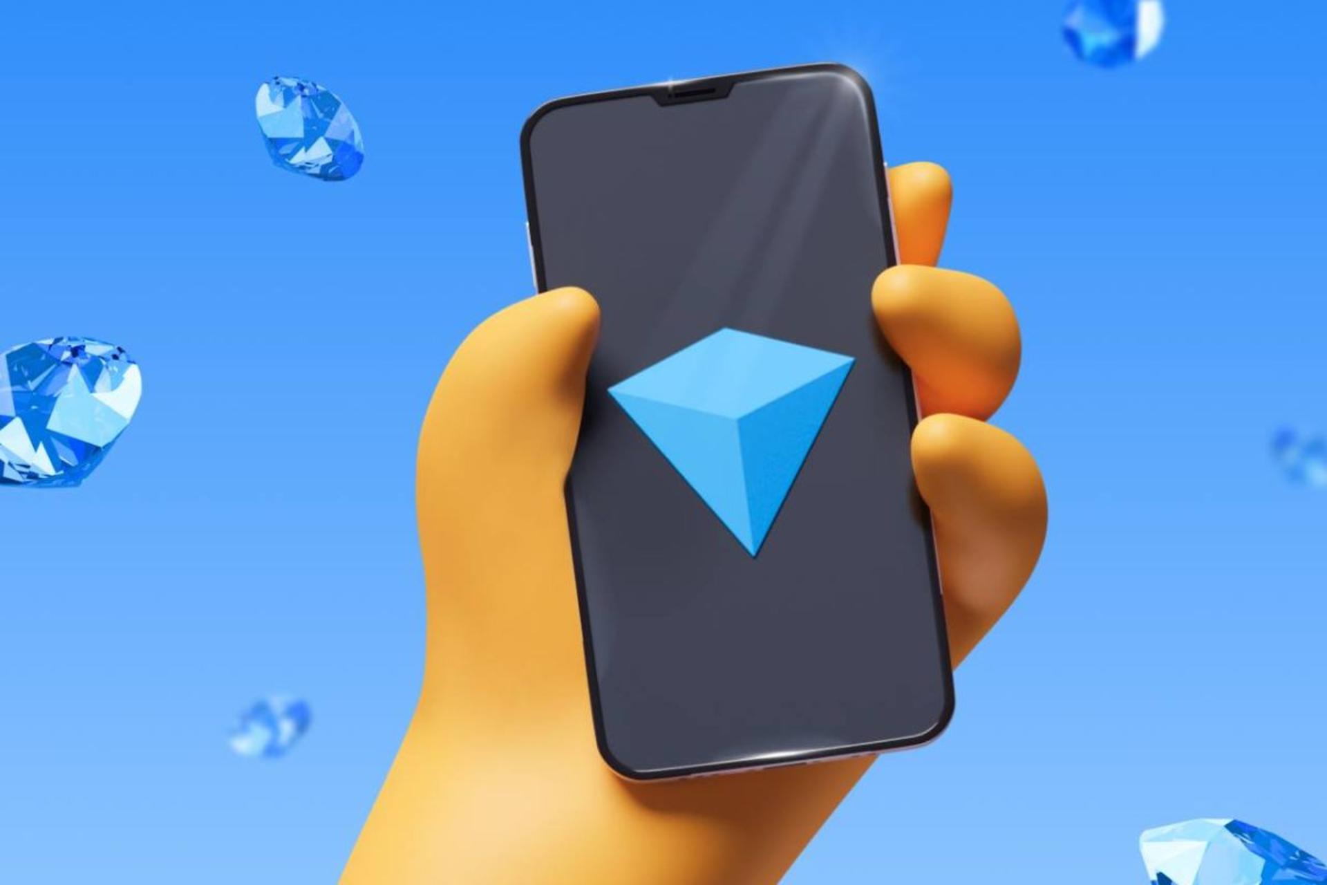 کیف پول تون کیپر در دست روی گوشی موبایل