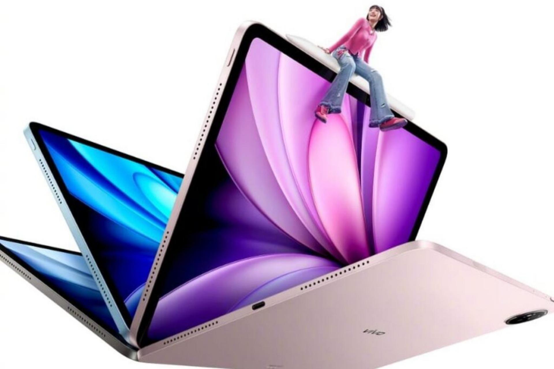 چهار عدد تبلت ویوو پد 5e کنار هم همراه با یک زن جوان
