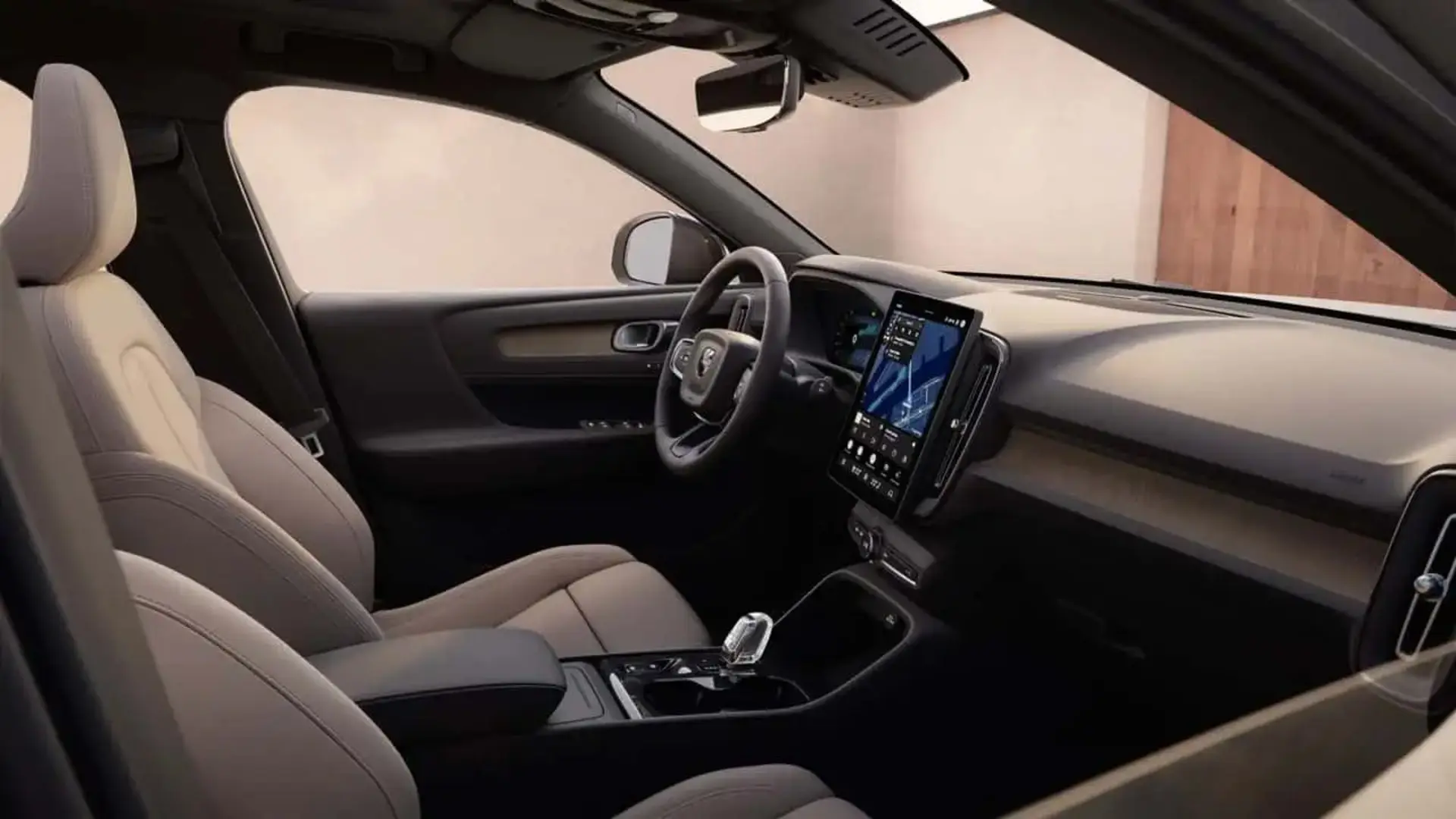 کابین خودروی ولوو (Volvo) XC40 مدل ۲۰۲۸ با صندلی‌های روشن و نمایشگر مرکزی