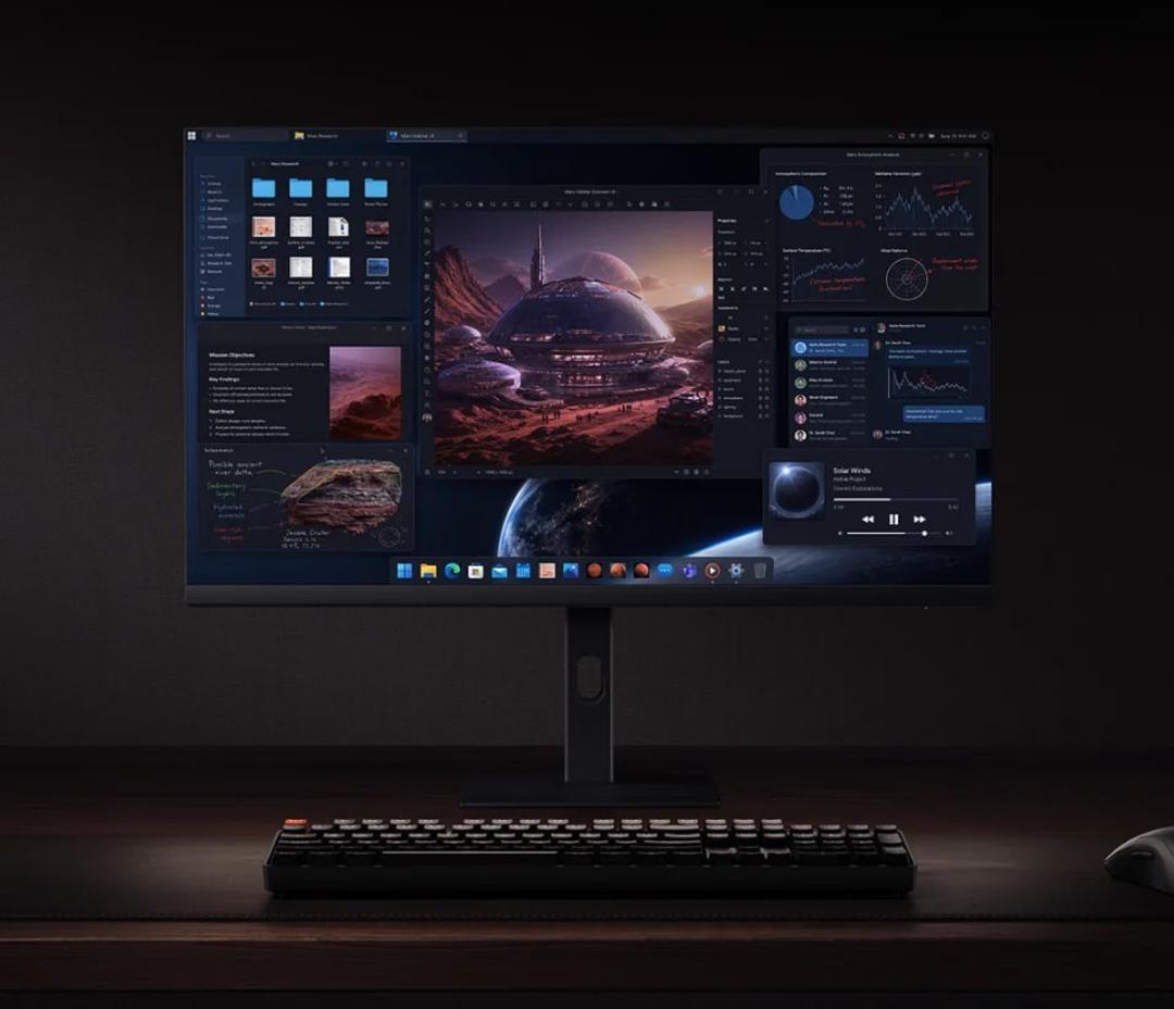 مانیتور شیائومی (Xiaomi) با نمایش محیط دسکتاپ و نمودارهای گرافیکی