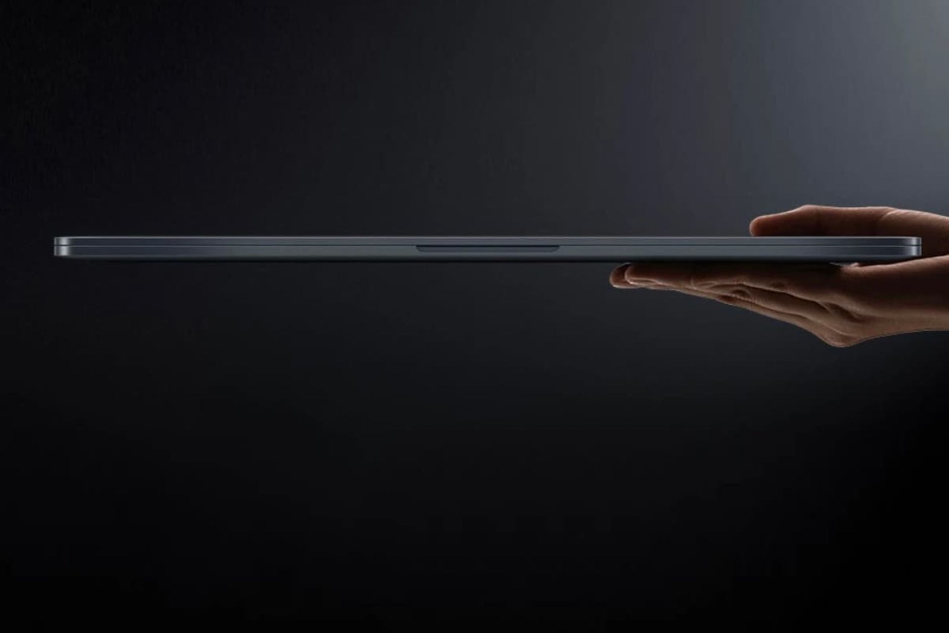 لپ تاپ ردمی بوک 15E شیائومی در دست