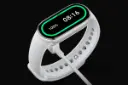 ساعت هوشمند اسمارت بند 10 شیائومی مدل سرامیک سفید در حال شارژ / Xiaomi Smart Band 10 Ceramic Edition